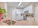 Modern kitchen with white cabinets, granite countertops, and stainless steel appliances at 602 Leaning Pin Ct, Summerville, SC 29485
