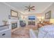 Cozy living room with fireplace, hardwood floors, and comfy seating at 602 Leaning Pin Ct, Summerville, SC 29485