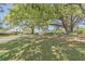Residential street lined with lush trees and charming homes at 602 Leaning Pin Ct, Summerville, SC 29485