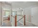 Upstairs hallway with a view of a bedroom and staircase at 602 Leaning Pin Ct, Summerville, SC 29485