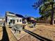 Relaxing backyard patio with fire pit and comfortable seating at 8731 Evangeline Dr, North Charleston, SC 29420