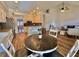 Open concept kitchen with breakfast nook, looking toward Gathering room at 8731 Evangeline Dr, North Charleston, SC 29420
