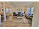 Spacious living room with hardwood floors, neutral colors, and ample natural light at 8731 Evangeline Dr, North Charleston, SC 29420