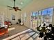 Bright sunroom with tile floors, sliding doors, and a view at 8731 Evangeline Dr, North Charleston, SC 29420