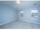 Spacious bedroom with gray carpet and vaulted ceilings at 8875 Jenny Lind St, North Charleston, SC 29406