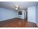 Hardwood floors, light blue walls and kitchen bar at 8875 Jenny Lind St, North Charleston, SC 29406