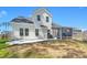 House exterior showcasing backyard patio and screened porch at 103 Oyama Rd, Summerville, SC 29486