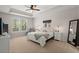 Spacious primary bedroom with carpeted floors and plenty of natural light at 103 Oyama Rd, Summerville, SC 29486
