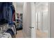Walk-in closet with built-in shelving and hanging rods at 103 Oyama Rd, Summerville, SC 29486
