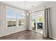 Bright dining area with sliding glass doors leading to a patio at 103 Oyama Rd, Summerville, SC 29486