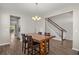Spacious dining room with hardwood floors and view to kitchen at 103 Oyama Rd, Summerville, SC 29486