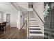 Bright and airy entryway with hardwood floors and staircase at 103 Oyama Rd, Summerville, SC 29486