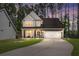 Two-story house with gray siding, stone accents, and a white door at 103 Oyama Rd, Summerville, SC 29486