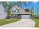 Two-story house with stone and siding, two-car garage at 103 Oyama Rd, Summerville, SC 29486