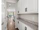 White kitchen cabinets and granite countertops with butler's pantry at 103 Oyama Rd, Summerville, SC 29486