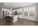 Bright kitchen featuring white cabinets and a granite island at 103 Oyama Rd, Summerville, SC 29486