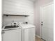 Laundry room with Samsung washer and dryer and wood shelf at 103 Oyama Rd, Summerville, SC 29486