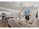 Spacious living room with sectional sofa, fireplace, and kitchen access at 103 Oyama Rd, Summerville, SC 29486