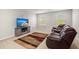 Relaxing loft area with leather recliners and a large TV at 103 Oyama Rd, Summerville, SC 29486