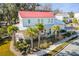 White house with red roof, palm trees, and landscaped yard; in a quiet neighborhood at 1086 Cinder St, Mount Pleasant, SC 29464