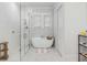 Spa-like bathroom with a freestanding tub and walk-in shower at 1086 Cinder St, Mount Pleasant, SC 29464