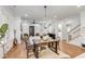 Farmhouse style dining room with wooden table and chandelier at 1086 Cinder St, Mount Pleasant, SC 29464