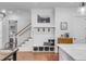 Bright entryway with built-in bench, storage, and staircase at 1086 Cinder St, Mount Pleasant, SC 29464