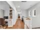 Bright hallway with hardwood floors and built-in shelving at 1086 Cinder St, Mount Pleasant, SC 29464