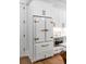 White SMEG refrigerator with brass accents in a modern kitchen at 1086 Cinder St, Mount Pleasant, SC 29464