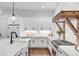 Modern kitchen with white cabinets and marble countertops at 1086 Cinder St, Mount Pleasant, SC 29464