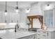 White kitchen with marble countertops and island at 1086 Cinder St, Mount Pleasant, SC 29464