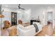 Spacious living room with white sofa and hardwood floors at 1086 Cinder St, Mount Pleasant, SC 29464