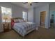 Bedroom with ensuite bathroom and wood dresser at 110 Danielle Ln, Summerville, SC 29483