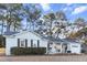 Charming ranch home with gray brick exterior and landscaping at 1109 Calm Water Ct, Mount Pleasant, SC 29464