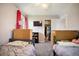 Two twin beds, closet, and TV in a shared bedroom at 115 Three Wood Ln, Summerville, SC 29483