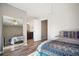 Spacious bedroom with large mirror and ensuite bathroom at 115 Three Wood Ln, Summerville, SC 29483