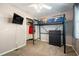 Bedroom with a loft bed, dresser, and closet; TV mounted on the wall at 115 Three Wood Ln, Summerville, SC 29483