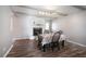 Bright dining area with hardwood floors and fireplace at 115 Three Wood Ln, Summerville, SC 29483