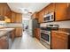 Modern kitchen with stainless steel appliances and wood cabinets at 115 Three Wood Ln, Summerville, SC 29483