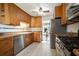 Modern kitchen with stainless steel appliances and wood cabinets at 115 Three Wood Ln, Summerville, SC 29483