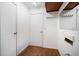 Laundry area with flooring, a door, and a mirror at 115 Three Wood Ln, Summerville, SC 29483