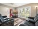 Living room with gray sofas and large window at 115 Three Wood Ln, Summerville, SC 29483