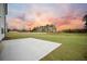 Spacious backyard with a large concrete patio at 117 Arabian Drive Lot B, Summerville, SC 29483