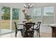 Charming breakfast nook with round table and sliding glass door at 117 Arabian Drive Lot B, Summerville, SC 29483