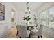 Bright dining room with round table and six chairs at 117 Arabian Drive Lot B, Summerville, SC 29483