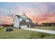 Two-story house with white siding, gray roof, and a long driveway at 117 Arabian Drive Lot B, Summerville, SC 29483