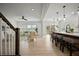 Open concept kitchen with island, white cabinets, and modern appliances at 117 Arabian Drive Lot B, Summerville, SC 29483