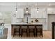 Modern kitchen with large island, white cabinets, and pendant lighting at 117 Arabian Drive Lot B, Summerville, SC 29483