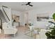 Light-filled living room featuring hardwood floors and access to staircase at 117 Arabian Drive Lot B, Summerville, SC 29483