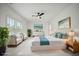 Spacious main bedroom with a king-size bed and sitting area at 117 Arabian Drive Lot B, Summerville, SC 29483